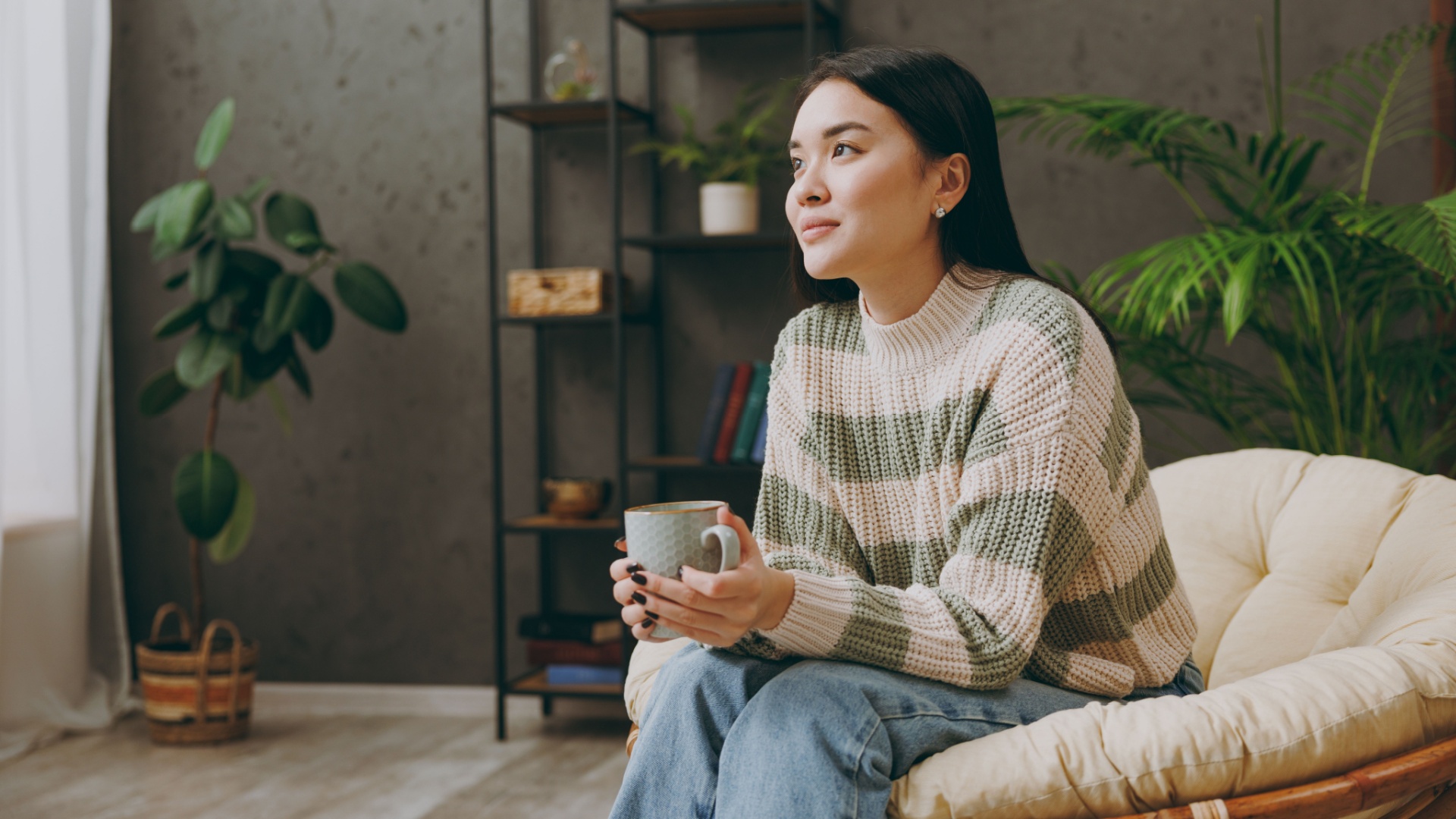 woman sitting on sofa