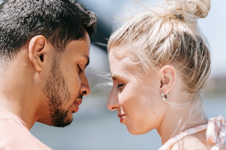 man and woman about to kiss