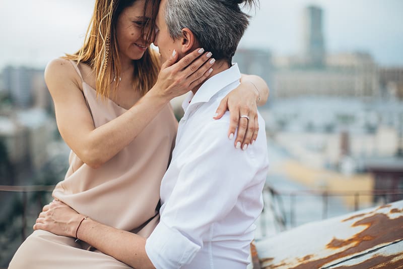 loving couple hugging on the rooftop