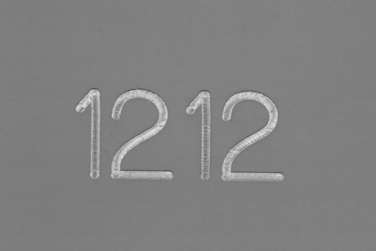 1212 on a gray background