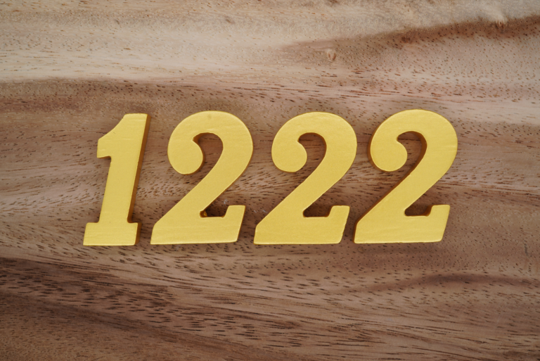 number 1222 on a wooden base