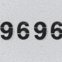 number 9696 drawn on a gray background