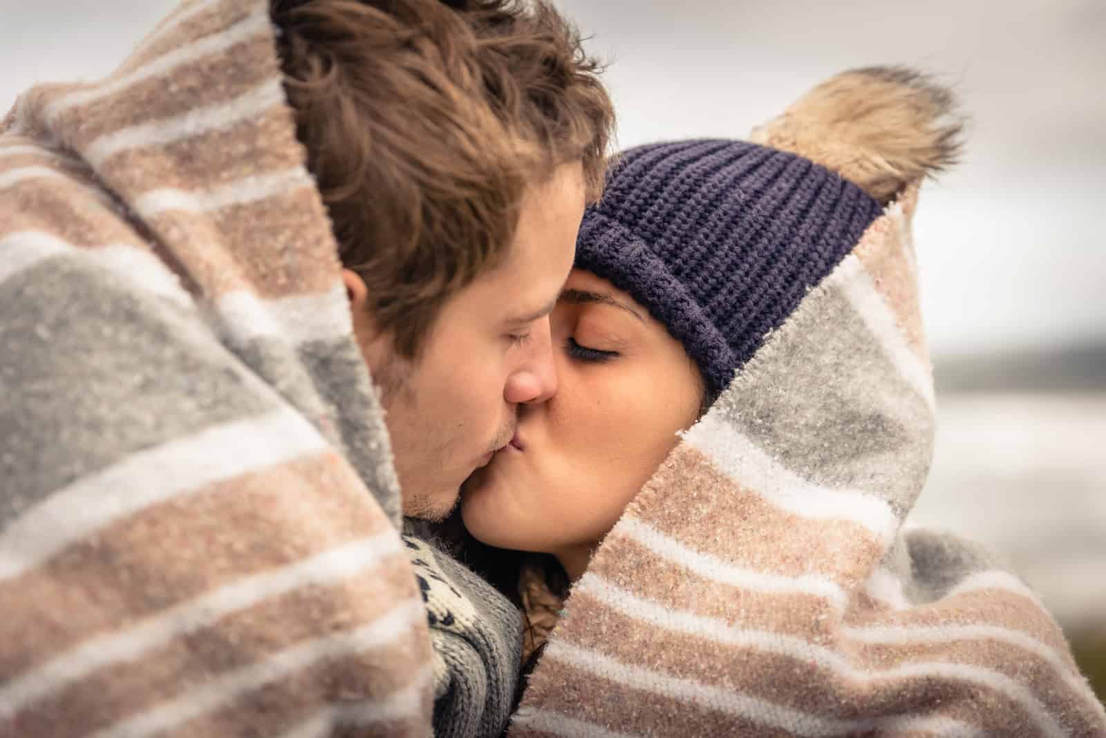 embracing loving couple kissing