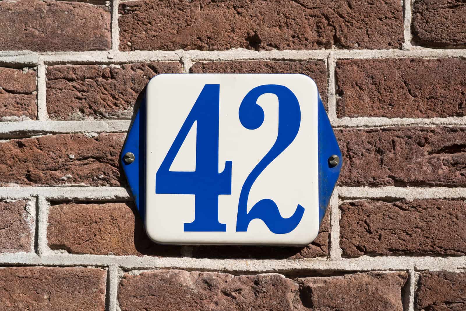 house number 42 in brick wall