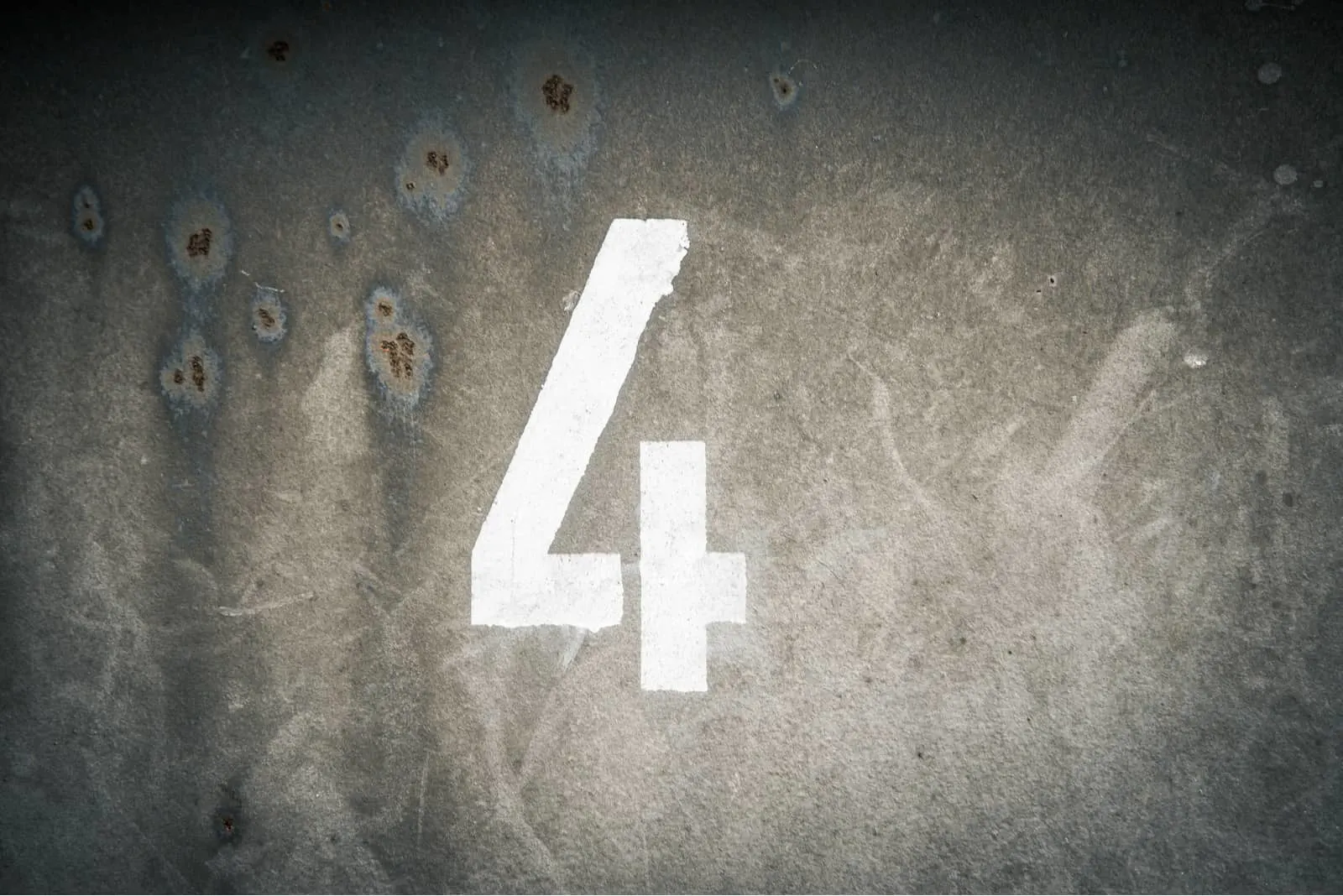 white number 4 with grey background