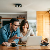 couple sitting in cafe discussing couple username ideas