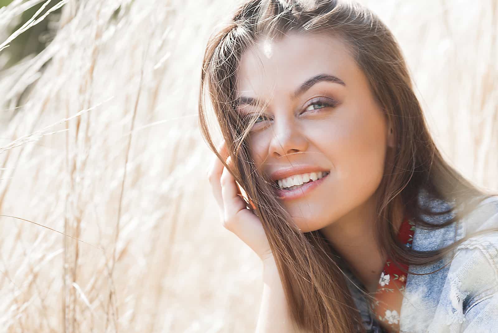 a smiling brown-haired woman