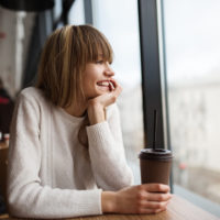 happy girl drinking coffee