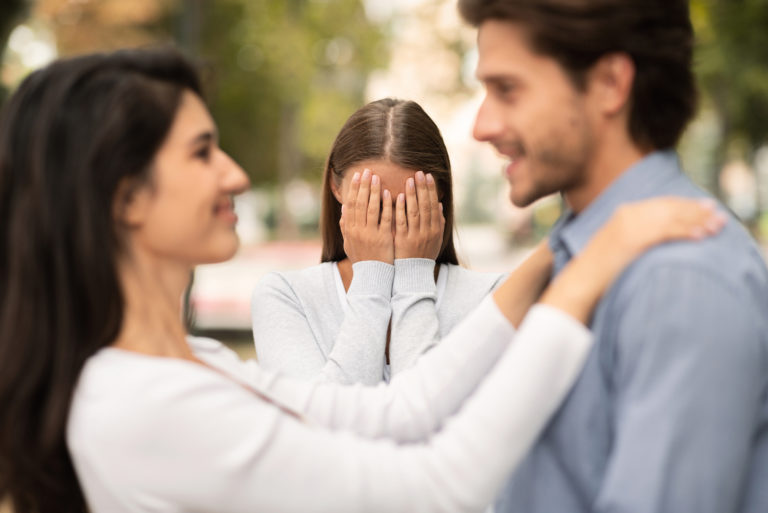 woman witnessing her husband cheatiing