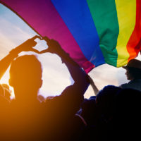 LGBT parade with flag