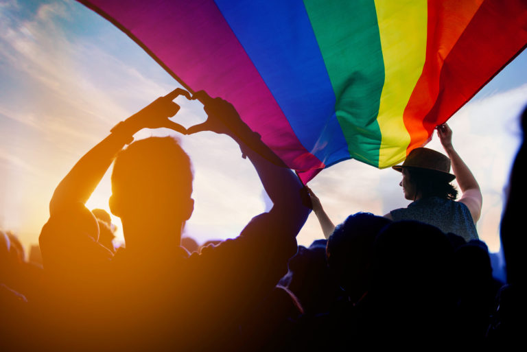 LGBT parade with flag