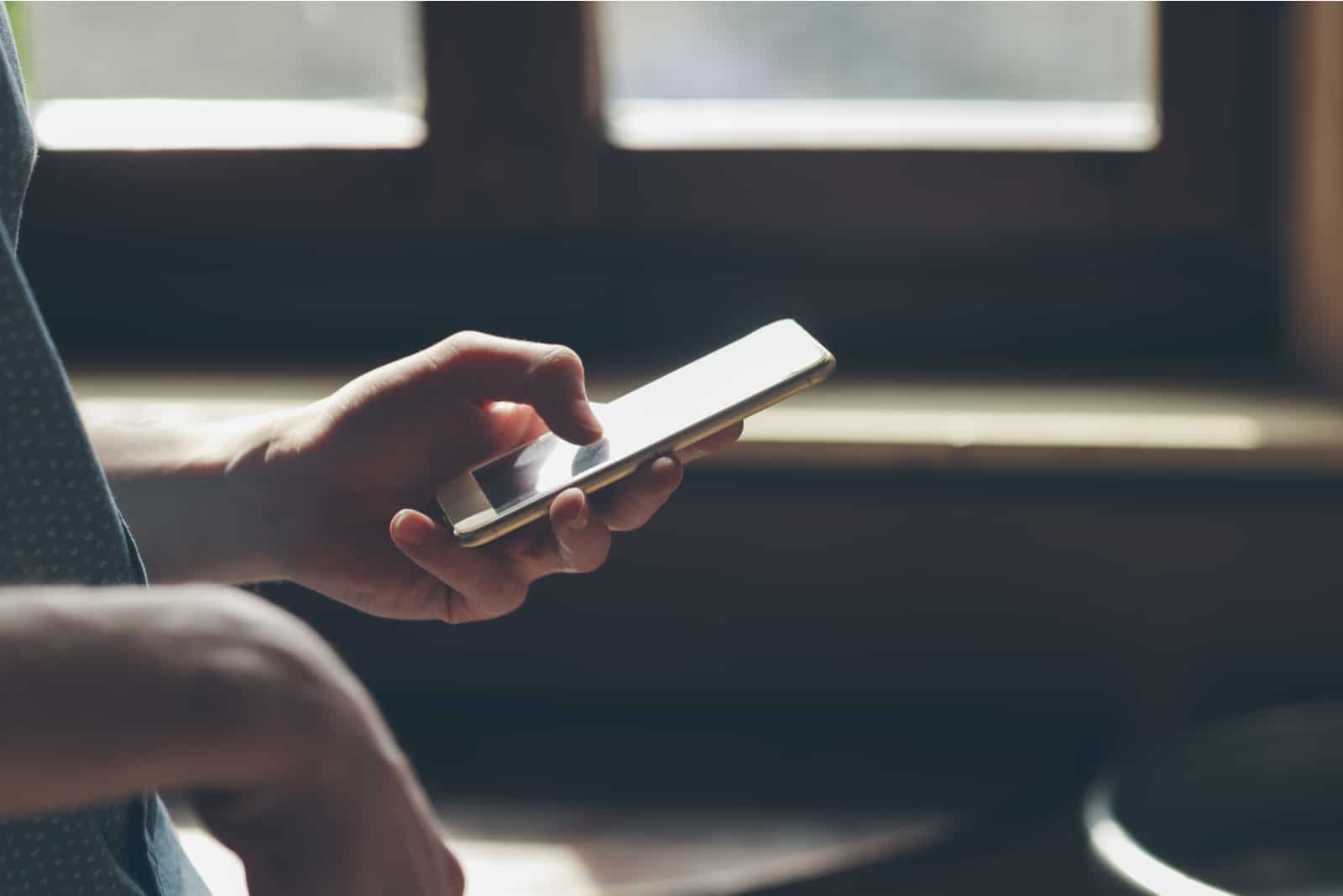 man with phone in hand 