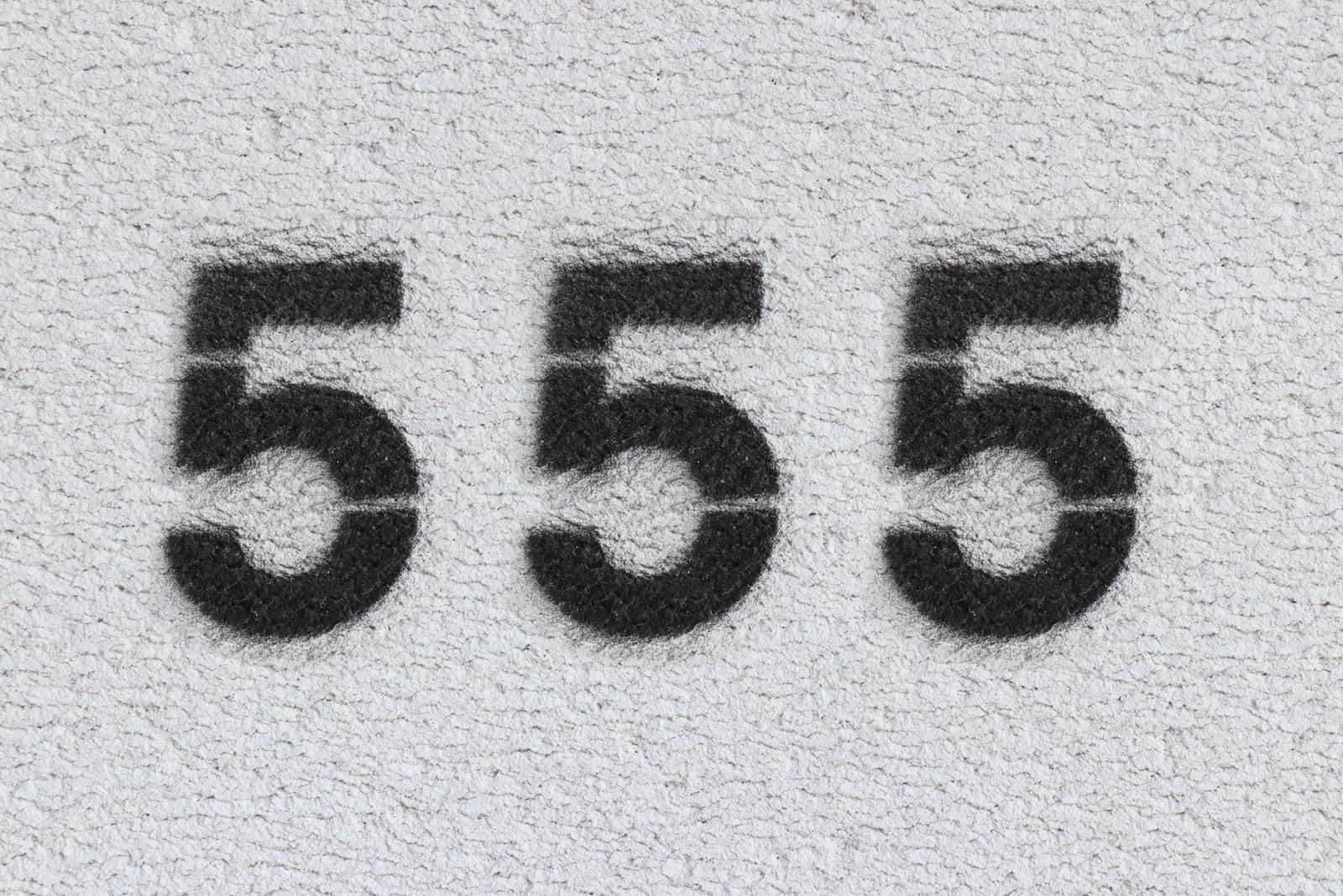 number 555 on grey background
