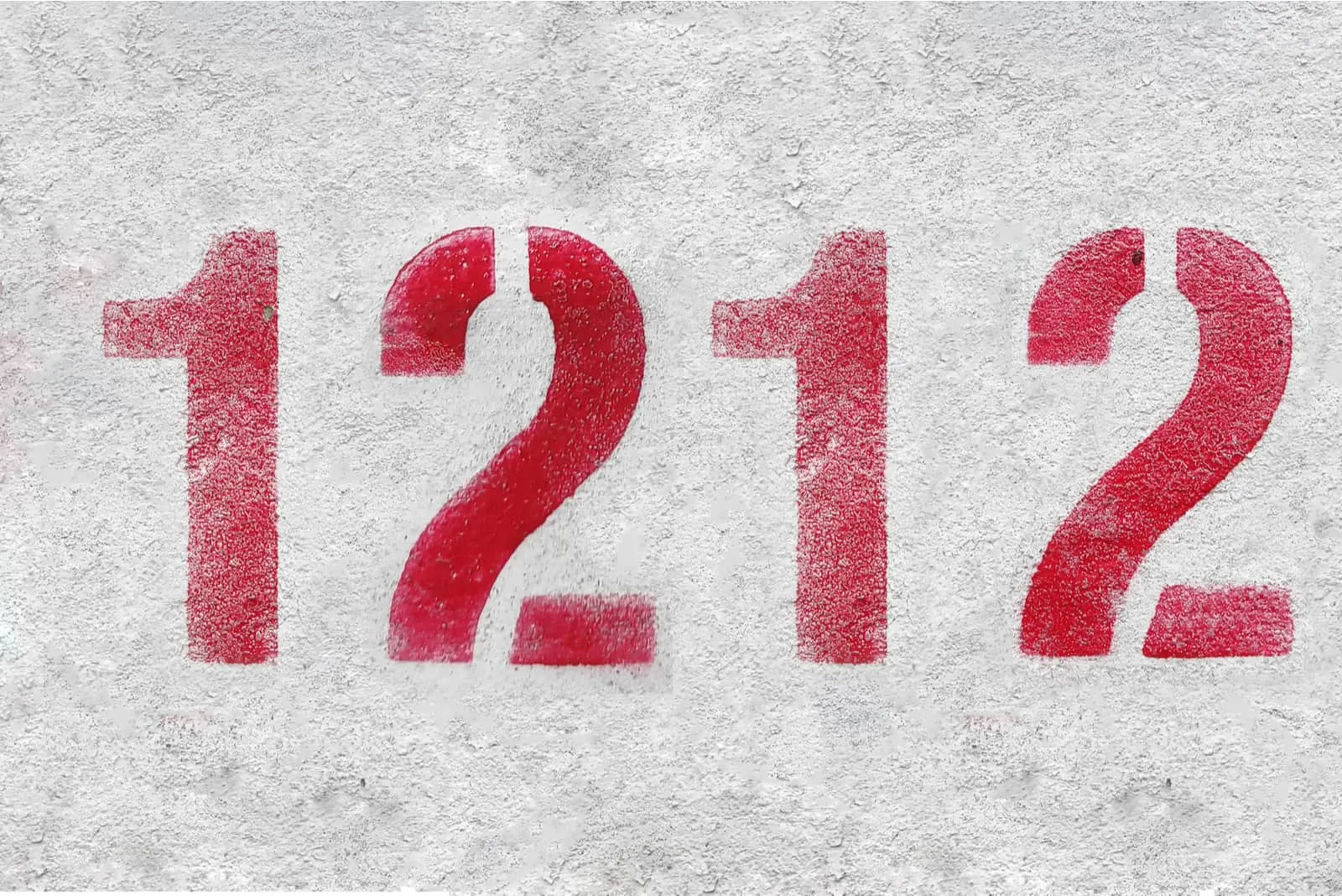 red 1212 number on grey wall