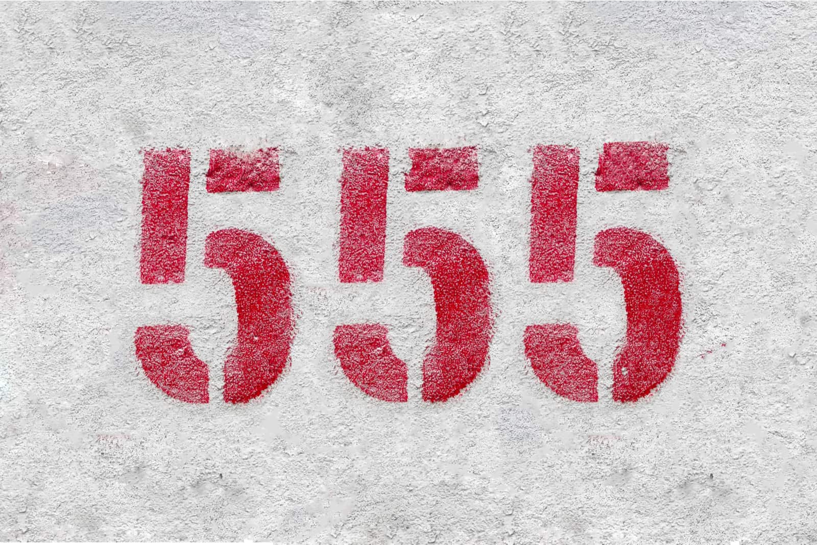 red colored number 555 on grey background