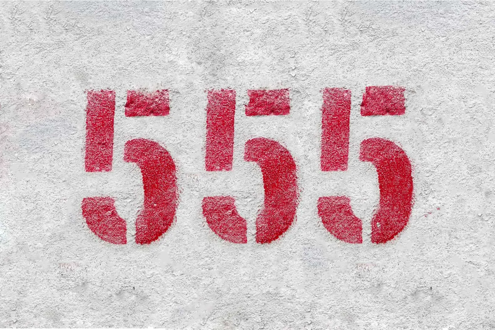 red colored number 555 on grey background