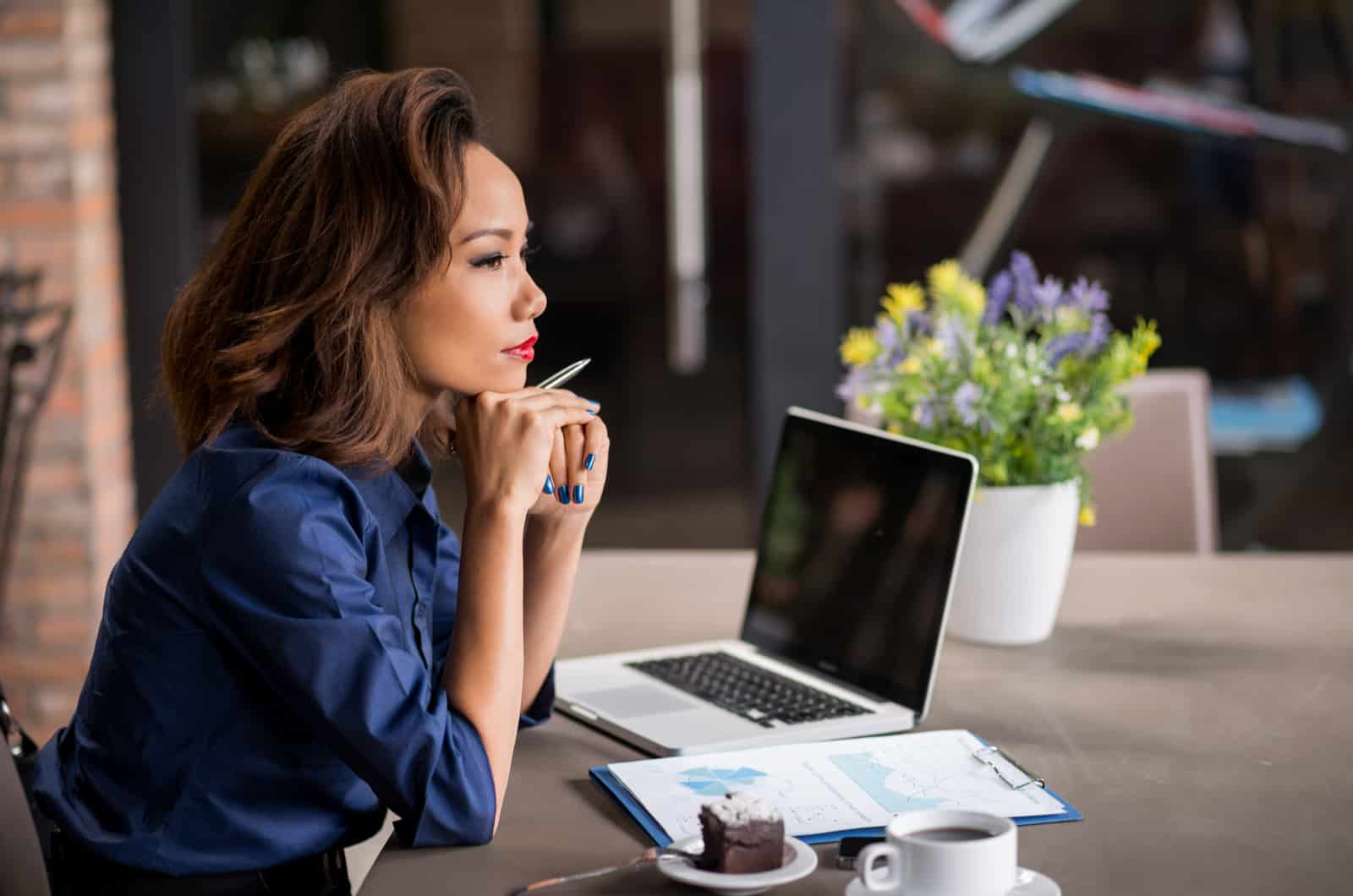 woman sitting and thinking about something