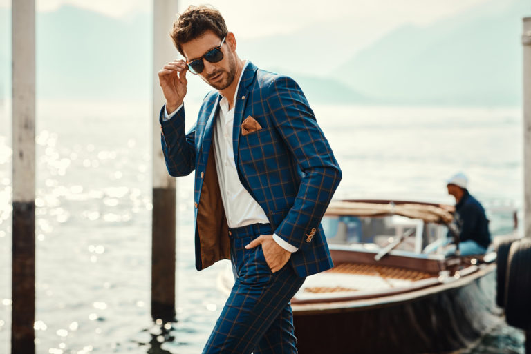 handsome man in suit standing outdoor
