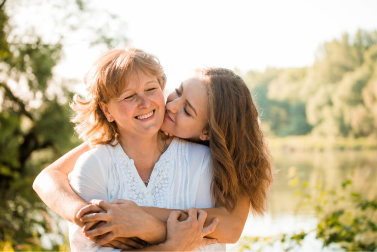 daughter hugging her mother