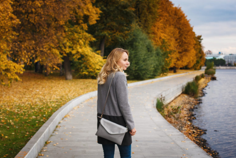 woman walking by river