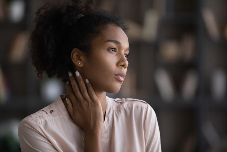 serious mindful woman looking at distance