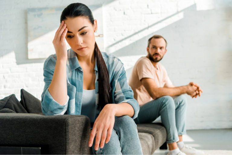 unhappy couple fighting