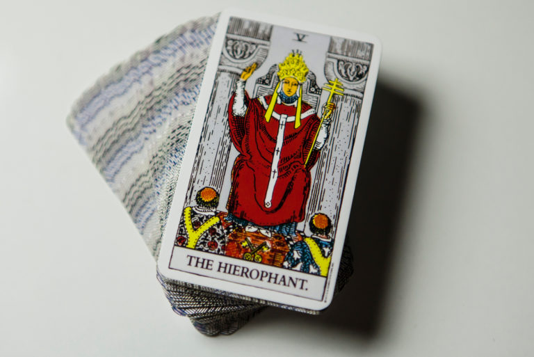 the hierophant tarot card on the top of the cards
