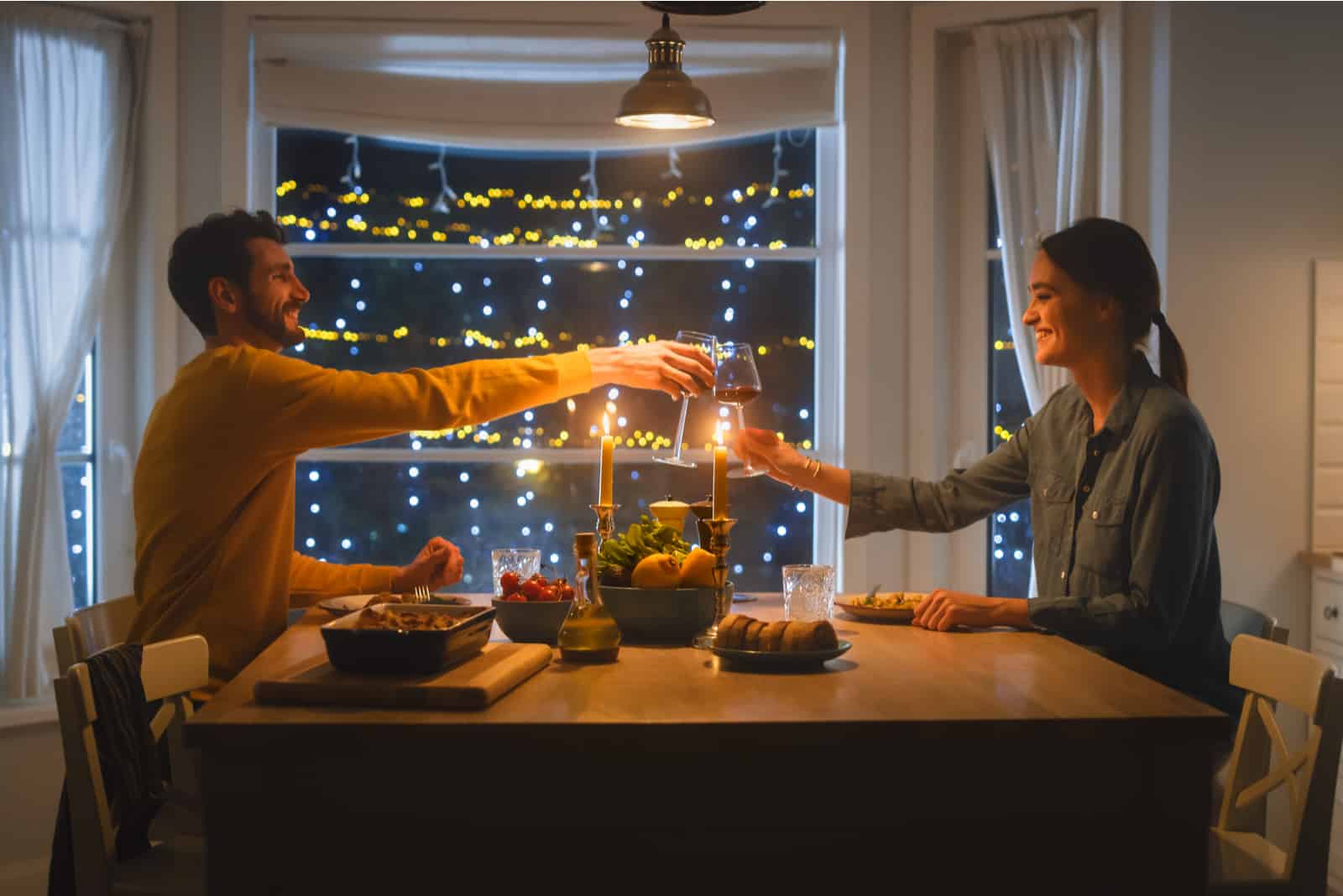 couple having dinner in an apartment
