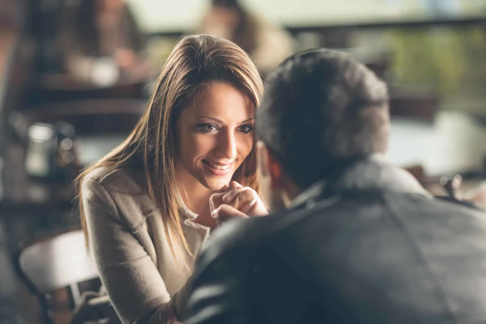 man flirting with woman at lunch