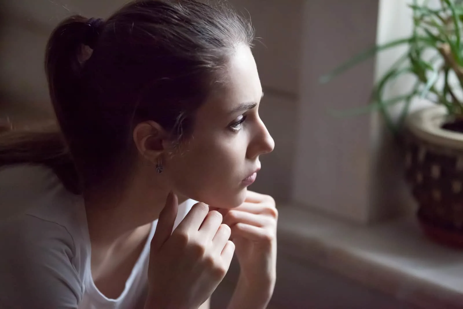 mindful serious woman looking at distance