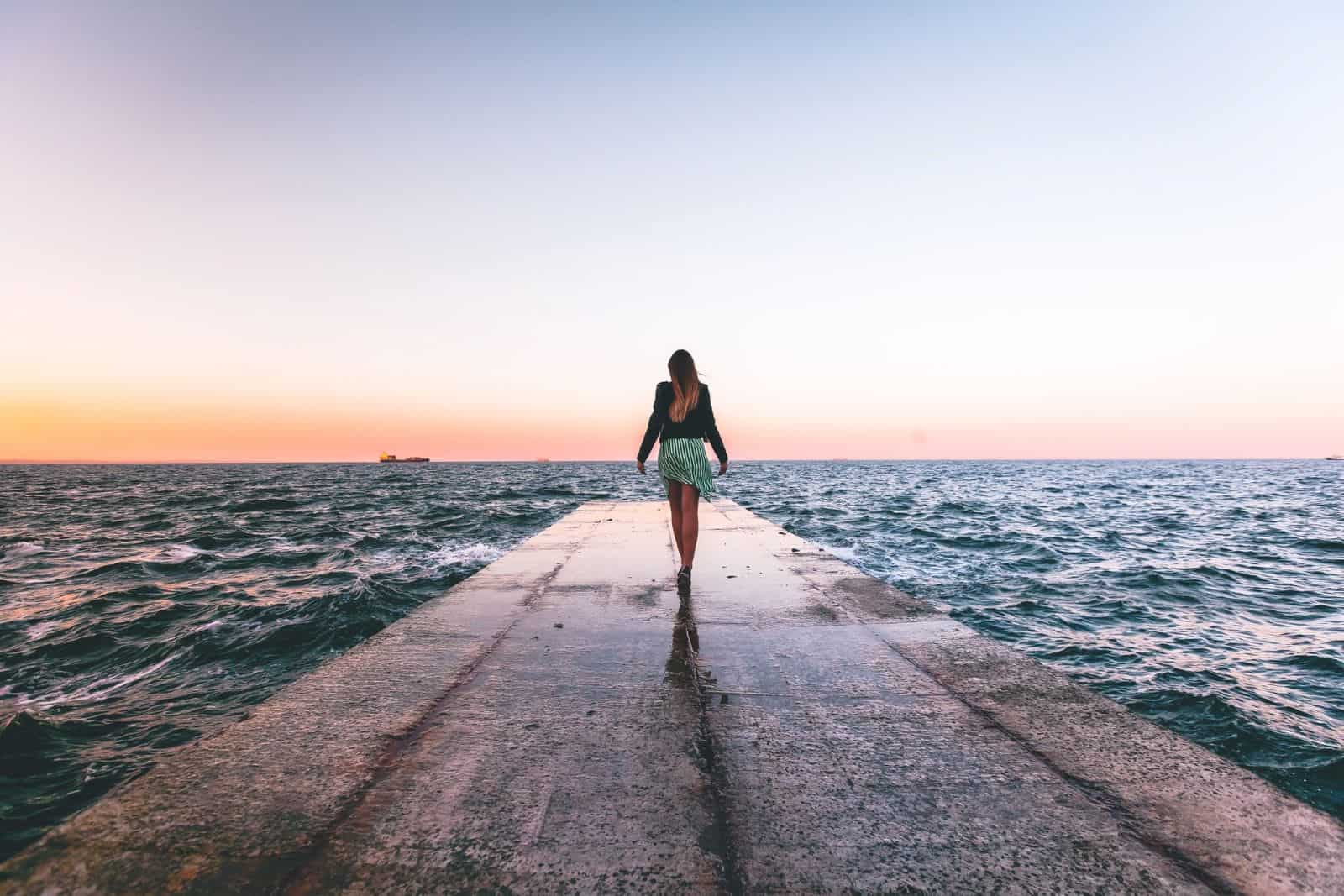 woman walking on a deck