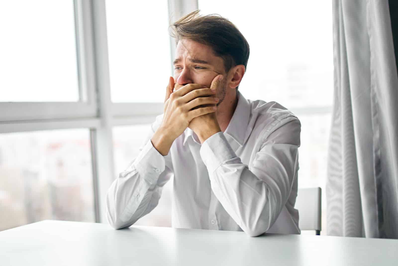 young man crying