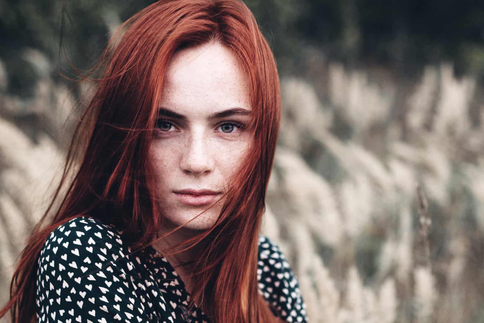 mysterious woman with a serious face