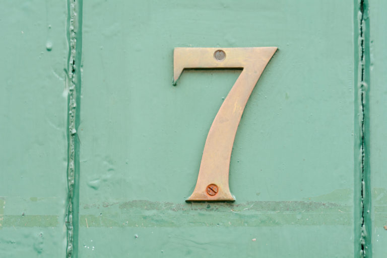 number seven on green background