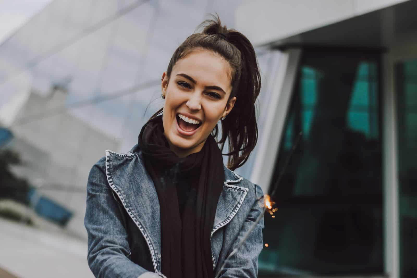 brunette woman laughing