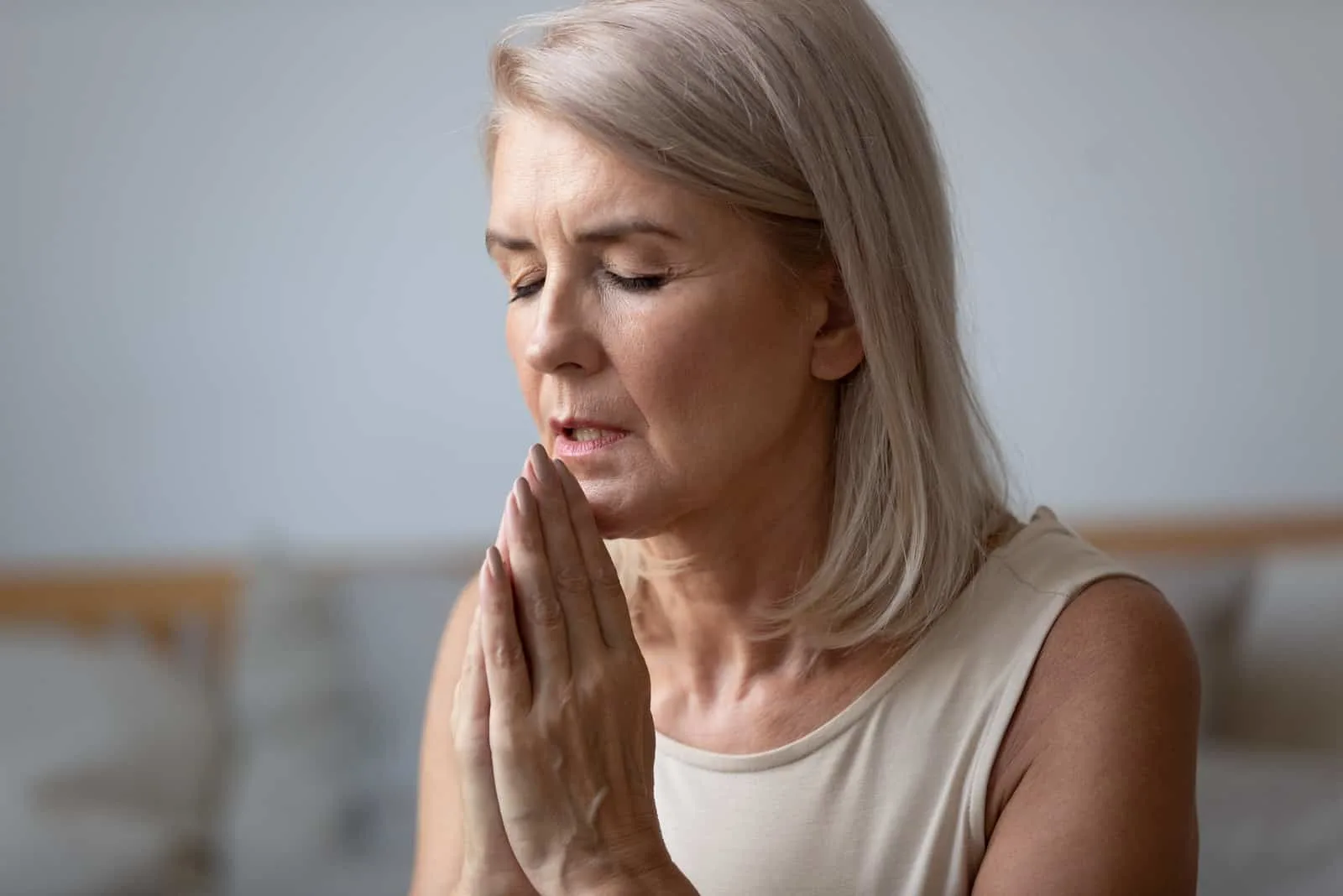 middle aged woman praying