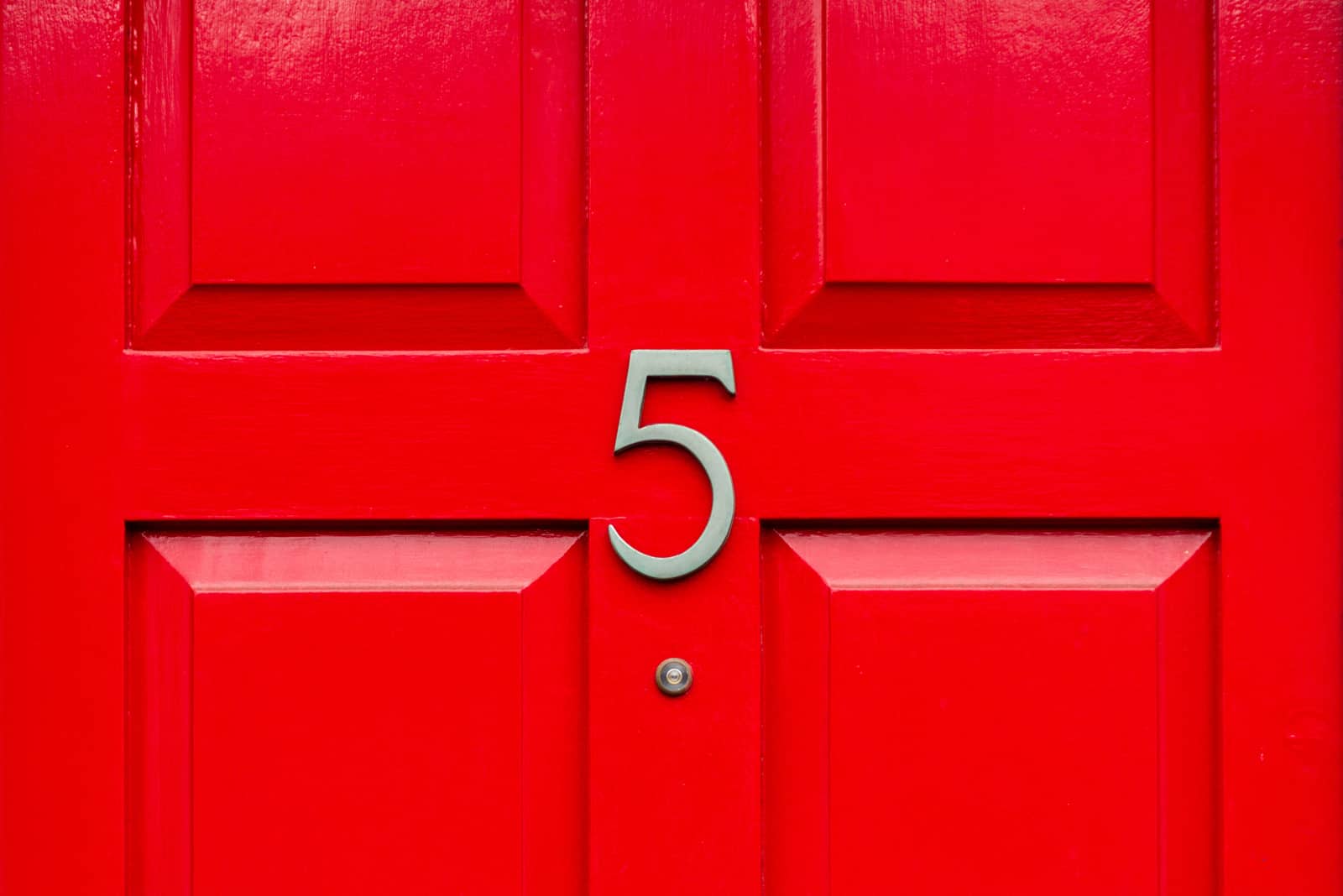number 5 on a red wooden door