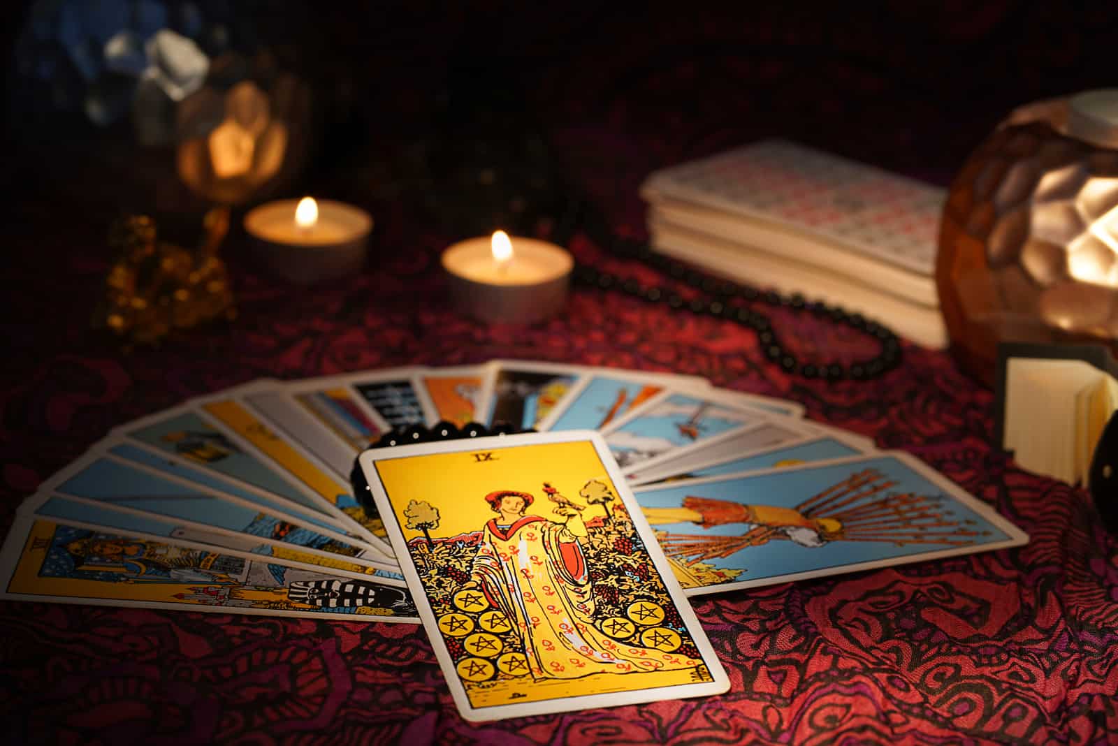 tarot cards with nine of pentacles