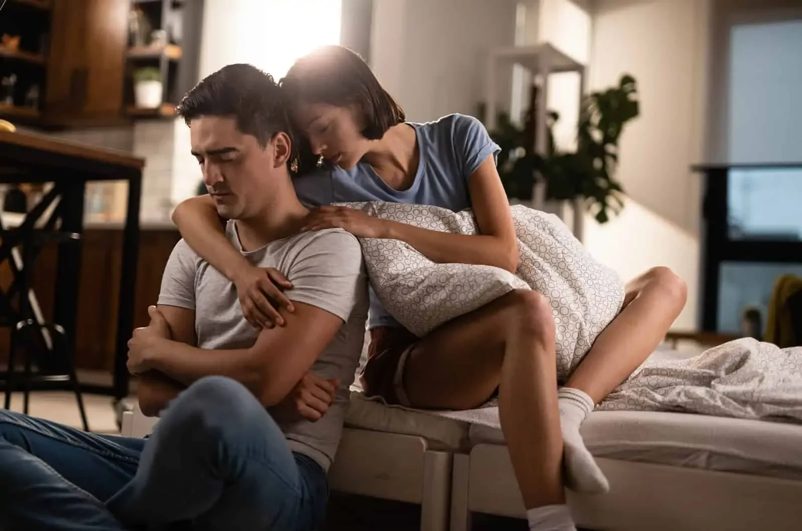 woman hugging man from behind