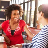 woman talking to her coworker