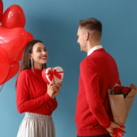 couple exchanging presents for Valentine's Day