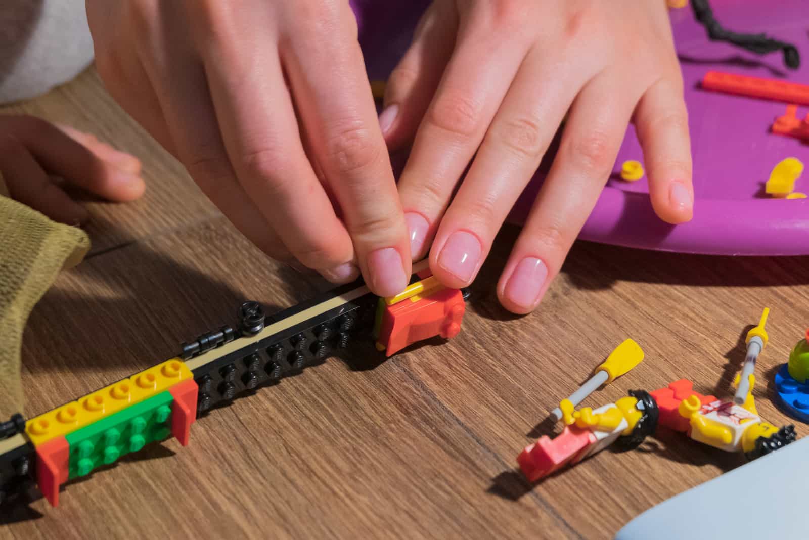 woman building lego