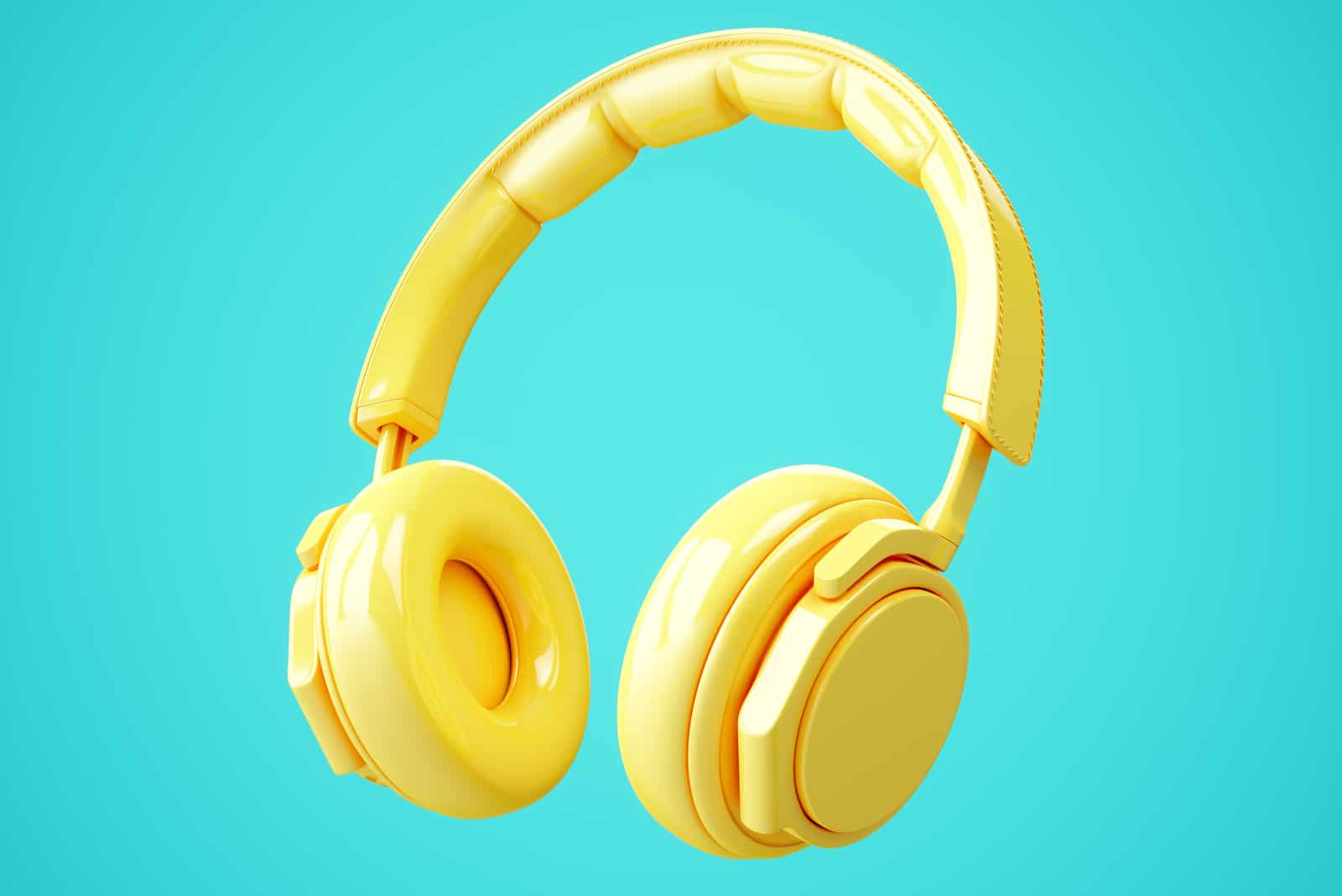 yellow headphones isolated on blue background