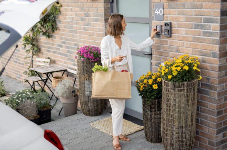 woman getting in house
