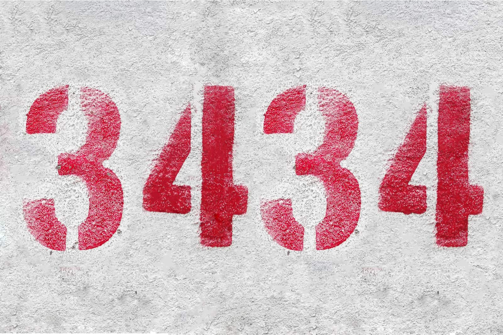 3434 in red on a gray background
