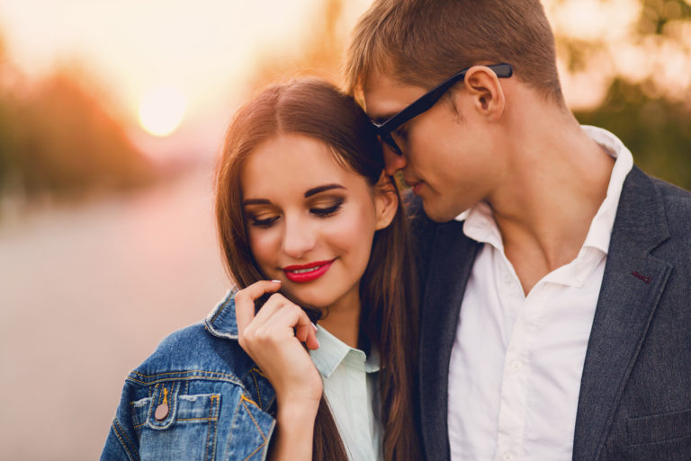 adorable couple in hug outdoor