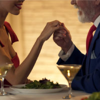 younger woman on a date with an older man