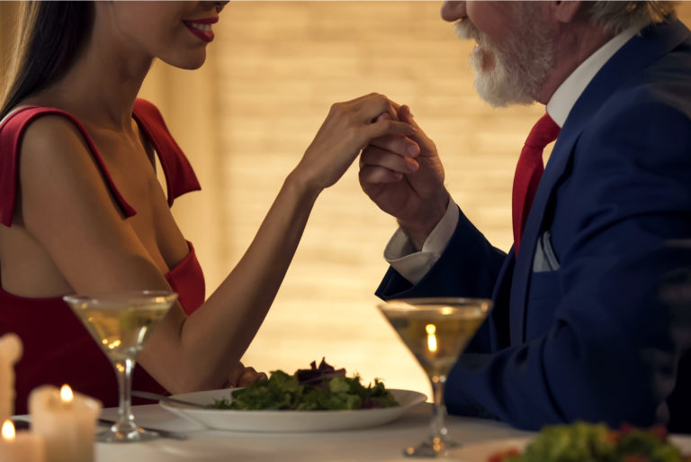 younger woman on a date with an older man
