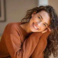 happy young woman experiencing post-breakup glow-up