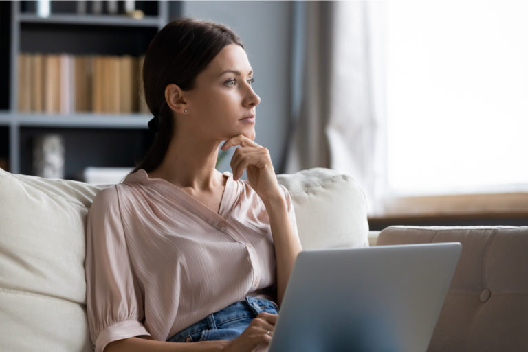 the imagined woman sits and looks away
